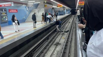 Ankara'da metro raylarına d&uuml;şen kadın kurtarıldı
