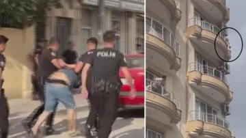 Annesini 5. katın balkonundan atmaya &ccedil;alıştı! Korkun&ccedil; anlar kamerada