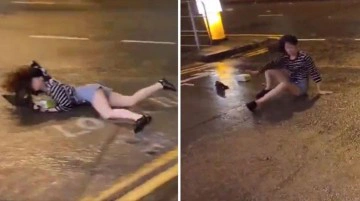 &Ccedil;in'de Saola Tayfunu nedeniyle etkisini arttıran şiddetli r&uuml;zgar bir kadını u&ccedil;urdu