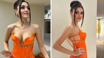 Hande Er&ccedil;el &ccedil;ok cesur! Elbisesini kaldırıp i&ccedil; &ccedil;amaşırının g&ouml;r&uuml;nmesini umursamadan poz verdi