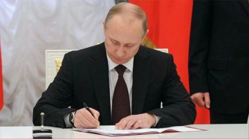 Putin, h&uuml;k&uuml;ml&uuml;lerin s&ouml;zleşme kapsamında askere alınmasına ilişkin yasayı imzaladı